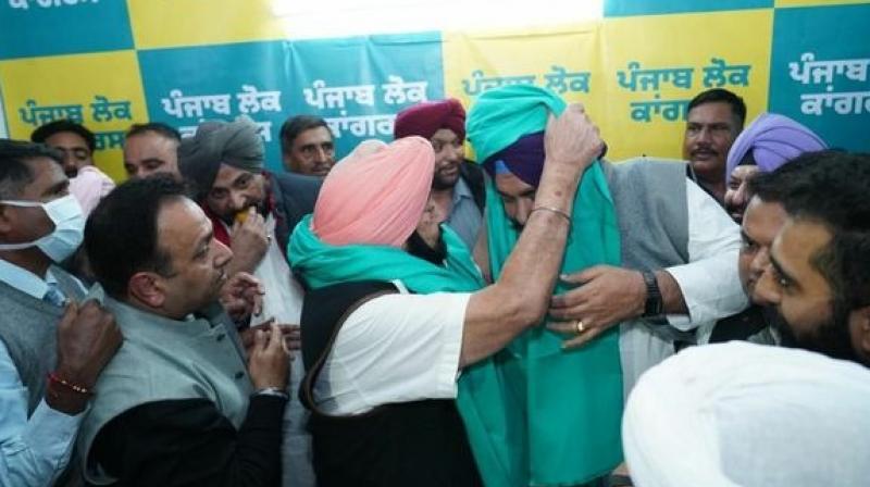Former MLA from Amritsar South Harinder Singh Thekedar join PLC