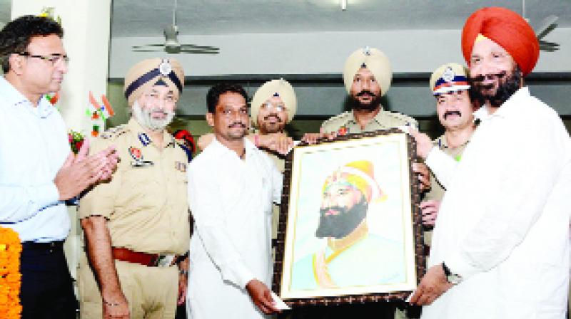 Jail Minister Sukhjinder Singh Randhawa and Police Officers  during the function