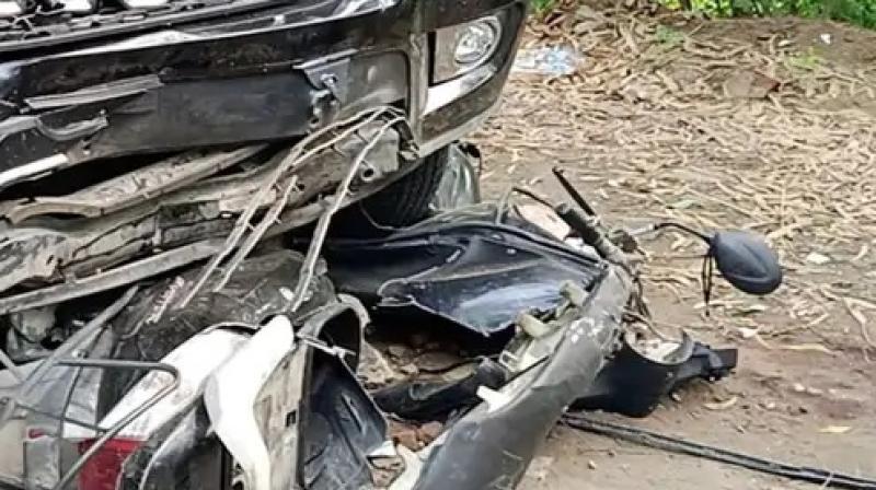 A Scorpio vehicle hit an elderly couple riding a scooty