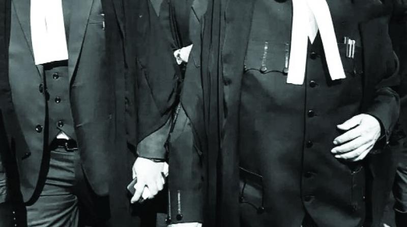 Denial of hearing on petition seeking exemption to lawyers from wearing coat and gown