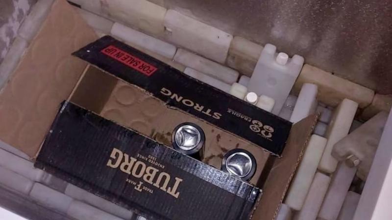 Cans of beer found in vaccine freezer of hospital, officials suspended