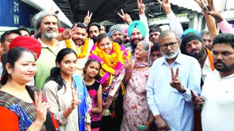 Halwai's son won medals in Asia Power lifting