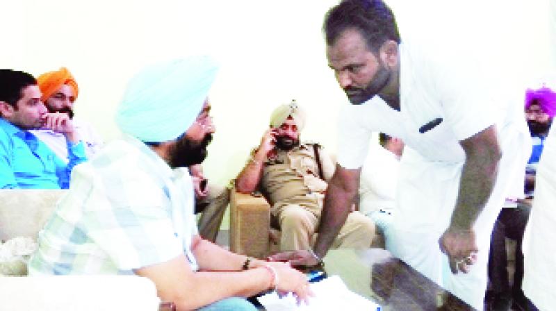 Gurpreet Singh Kangar listening to problems of people