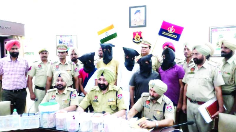 Police officers reporting during the press conference.