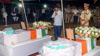 Ranchi: Jharkhand Chief Minister Hemant Soren pays tributes to martyrs Gautam Rana and Amit Tiwari, in Ranchi, Tuesday, Aug 15, 2023. Both personnel were killed in a cross encounter with Left Wing Extremists (LWE) at Tonto forest area in Chaibasa town. (PTI Photo)