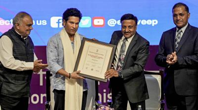 New Delhi: Chief Election Commissioner (ECI) Rajiv Kumar, and other commissioners Arun Goel and Anup Chandra Pandey with cricket legend Sachin Tendulkar during a programme where the latter was recognised as 'National Icon' of the ECI to encourage higher voter turnout, in New Delhi, Wednesday, Aug. 23, 2023. (PTI Photo/Vijay Verma)