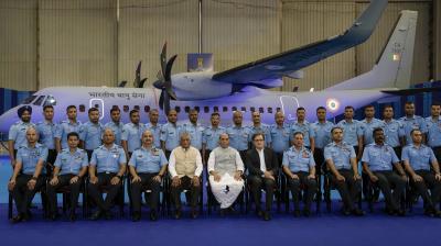 Hindon: Union Defence Minister Rajnath Singh with MoS VK Singh, IAF chief Air Chief Marshal V R Chaudhari and other IAF officers in a group photograph during formal induction of C-295 MW transport aircraft into Indian Air Force at the Hindon Air Force Station, Monday, Sept. 25, 2023. (PTI Photo/Vijay Verma)