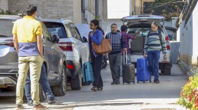 Ranchi: Income Tax department officials during a raid on the residence of Congress MP Dhiraj Prasad Sahu in connection with a disproportionate assets case, in Ranchi, Sunday, Dec. 10, 2023. (PTI Photo)