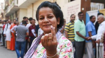 Gurugram: A woman shows her finger marked with indelible ink after casting vote at a polling station during the sixth phase of Lok Sabha elections, in Gurugram, Saturday, May 25, 2024. (PTI Photo)
