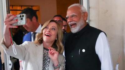 Italian Prime Minister Meloni with PM Modi.