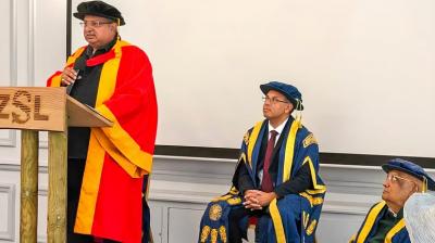 Akash Paul, Chairman Caparo India & Director Caparo Group Limited speaks while receiving an honorary doctorate from his father, University of Wolverhampton Chancellor Lord Swraj Paul, and Vice-Chancellor Ebrahim Adia, in London.