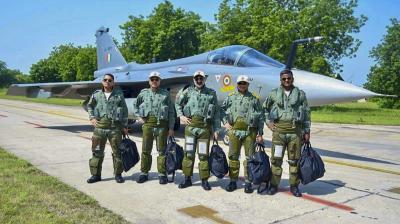 Jodhpur:  Vice Chief of Air Staff (VCAS) Air Marshal AP Singh, Vice Chief of the Army Staff, Lt Gen NS Raja Subramani, Vice Chief of the Naval Staff, Vice Admiral Krishna Swaminathan after flying in the indigenous Tejas fighter jet in the skies over the Air Force Station Jodhpur. (PTI Photo) 