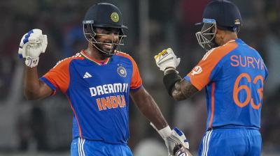 Hyderabad: India's Sanju Samson celebrates his century with captain Suryakumar Yadav during the third and final T20 International cricket match between India and Bangladesh at Rajiv Gandhi International Cricket Stadium, in Hyderabad, Saturday, Oct. 12, 2024. (PTI Photo/Shailendra Bhojak)