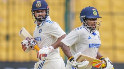 Bengaluru:  India's Rishabh Pant and Sarfaraz Khan run between the wickets during the fourth day of the first test cricket match between India and New Zealand at M Chinnaswamy Stadium, in Bengaluru, Saturday, Oct 19, 2024. (PTI Photo) 