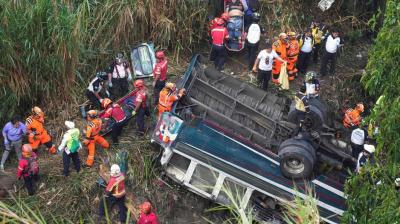 Bus falls off bridge in Guatemala.