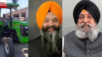 parks tractor in front of hall, Prem singh Chandumajra & Karnail Singh Panjoli Image.