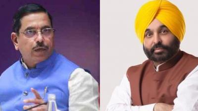 ਪ੍ਰਹਿਲਾਦ ਜੋਸ਼ੀ ਅਤੇ ਭਗਵੰਤ ਮਾਨ