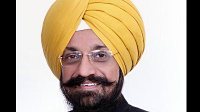 Dr. Karamjeet Singh