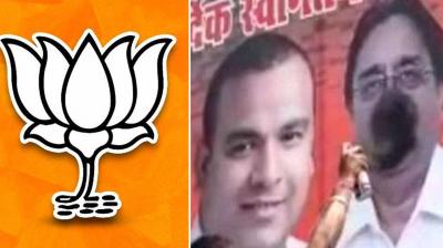 sprayed black paint on BJP's hoardings