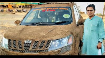 pune senior doctor coats his car with cow dung to beat heat