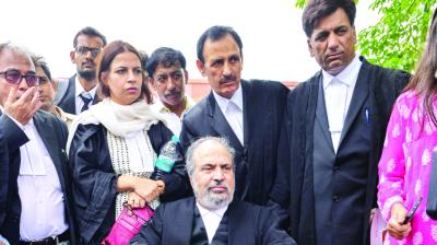 Senior PDP Leader Muzaffar Hussain Baig interacting with the media after taking part in the hearing of the 35-A challenging case