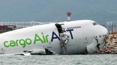 cargo plane skids off runway into sea at Hong Kong International Airport