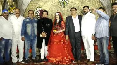 Bride and groom engaged in photo shoots at wedding