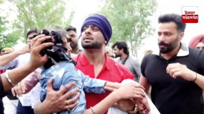 Punjabi singer Mankirat Aulakh helps a girl injured in an accident