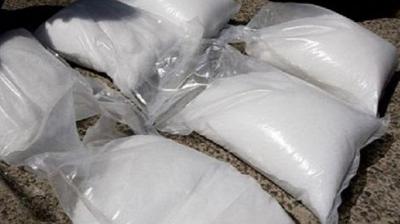  5 kg of 650 grams heroin & 2 Pak SIM