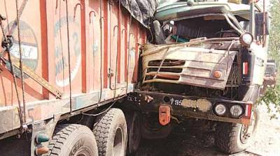 truck and a military vehicle