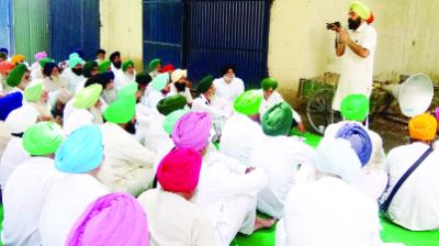 Harinder Singh Lakhowal addressing the protest rally 