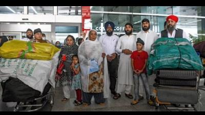 File photo of Afghan Sikhs arriving at Delhi's Airport from Kabul.