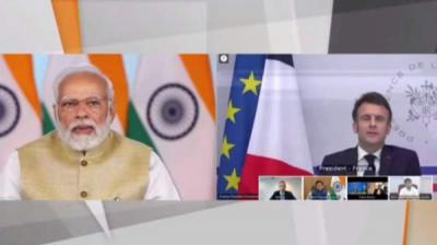 PM Modi Addressing a virtual meeting with President Emmanuel Macron on agreement between Air India and Airbus.