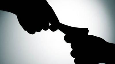 Uttar pradesh road transport official arrested while taking bribe