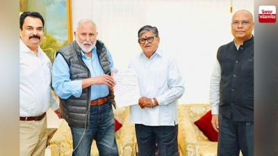 A check of Rs 1.11 crore handed over to the Governor for the welfare of poor meritorious students