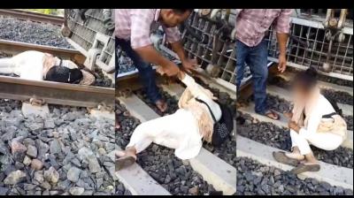  Girl Student Lies On Railway Tracks