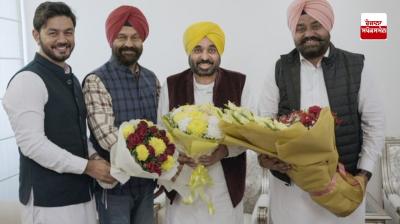 The three AAP MLAs who won the by-election met Bhagwant Mann