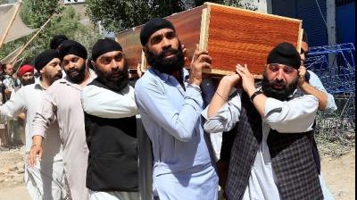 Sikhs Carrying the Body