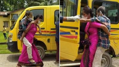 Daughter In Law Niharika Das Carrying Covid Positive father in law on back