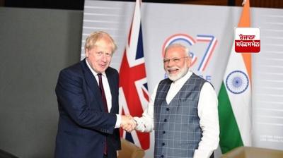 UK ਦੇ ਸਾਬਕਾ PM ਜਾਨਸਨ ਅਤੇ ਭਾਰਤ ਦੇ ਪ੍ਰਧਾਨ ਮੰਤਰੀ ਮੋਦੀ ਹੱਥ ਮਿਲਾਉਂਦੇ ਹੋਏ 