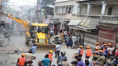 Unlawful possession of JCB removal in Dehradun
