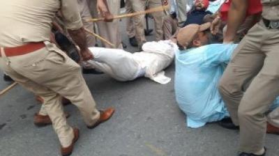 Contract employees protest against Manpreet Badal