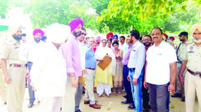 Bibi Razia Sultana Talking with Officer