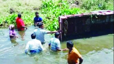 Tractor-Trolley Falls Into The Canal