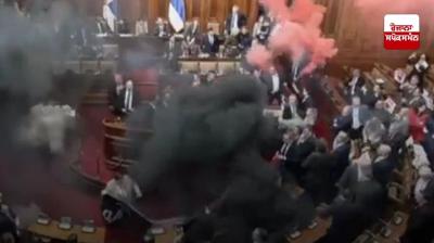 Opposition attacks Serbian parliament with smoke grenade, two injured