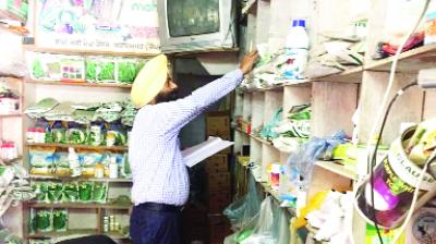 Officer Checking Fertilizer Store