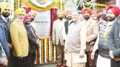 Sukhjinder Singh Randhawa with others foundation stone of new modern dairy