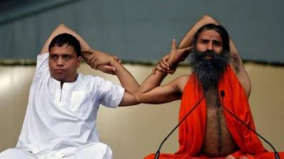 SC asks Ramdev, Balkrishna to appear before it in Patanjali advertising case