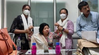 Minakshi Kakati Kalita was caught red-handed while accepting Rs. 4,000 as a part of the demanded bribe