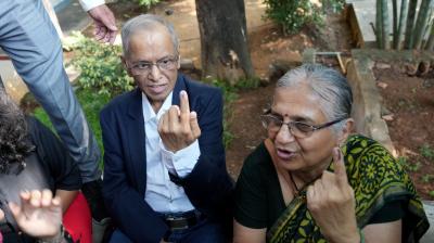 Infosys founder NR Narayana Murthy and wife Sudha Murthy after casting their vote
